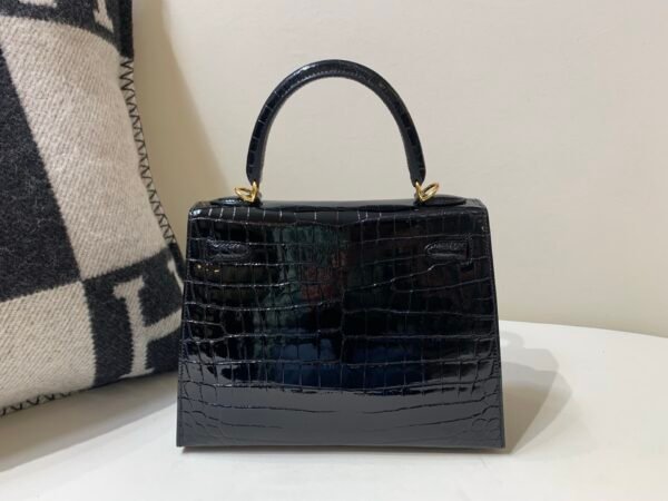 International Express 89 Nior Kelly 25CM Niloticus Leather Gold Hardware