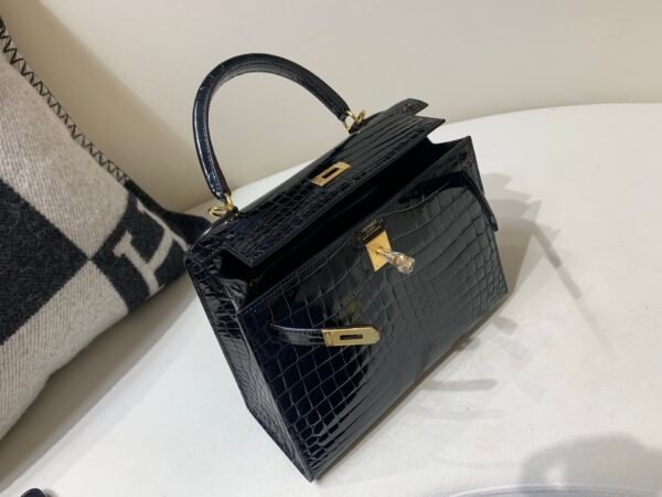 International Express 89 Nior Kelly 25CM Niloticus Leather Gold Hardware